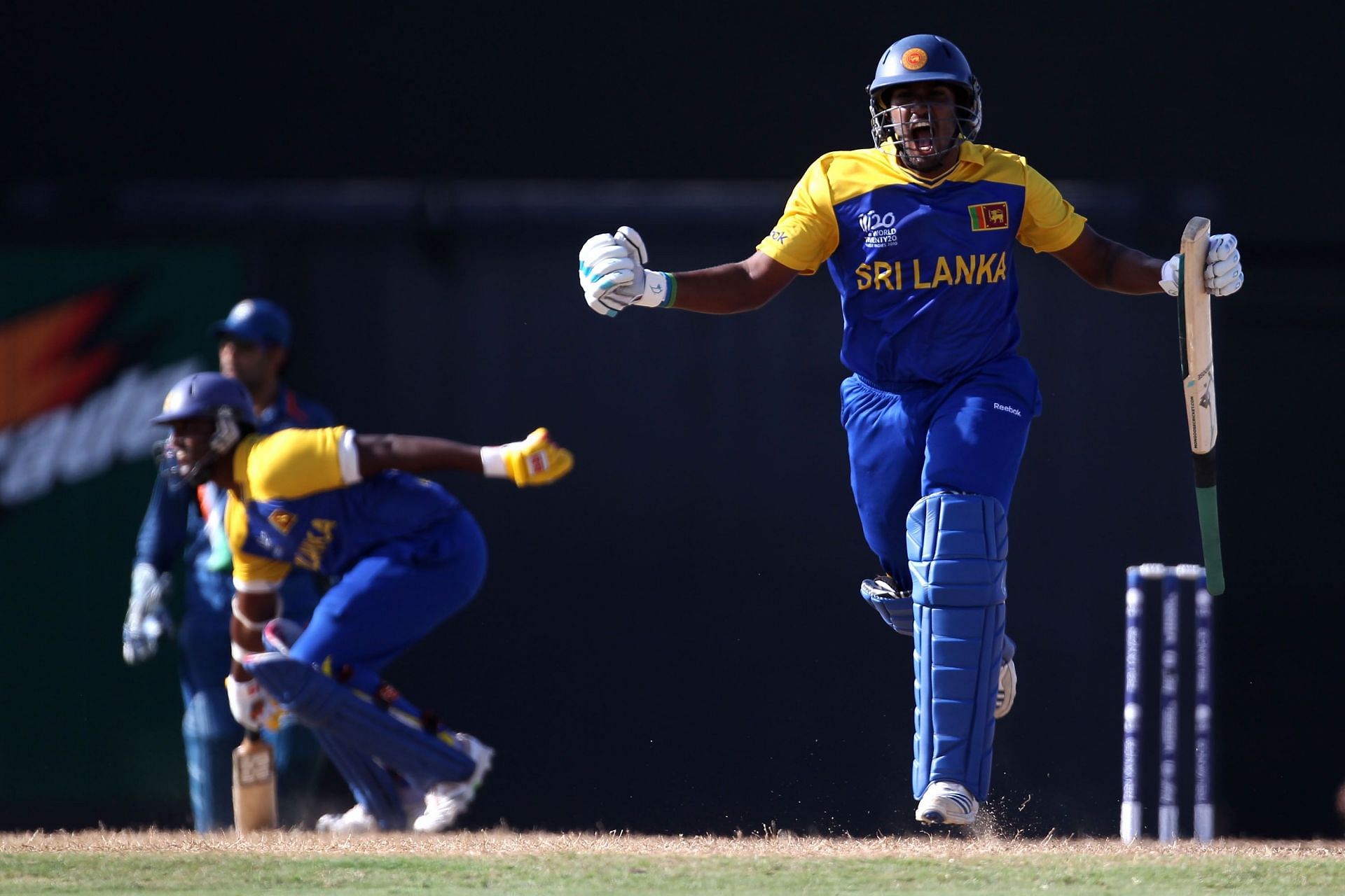 Chamara Kapugedera celebrates after hitting the winning runs against India. (Image Credit: Getty Images)
